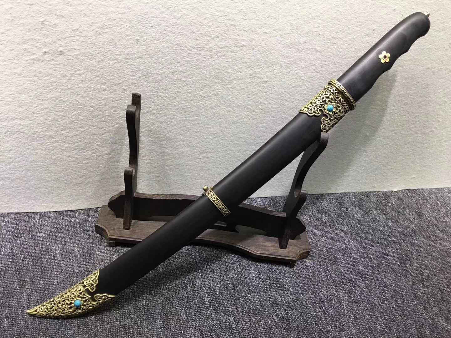 Persian knife,Sabre,High carbon steel burn blade,Ebony,Brass — close-up detail view