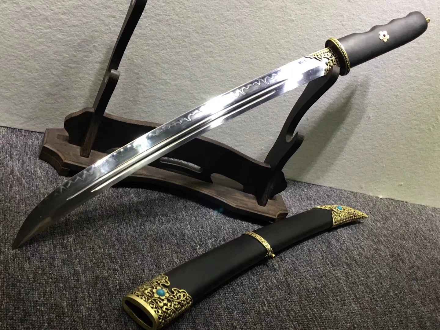 Persian knife,Sabre,High carbon steel burn blade,Ebony,Brass — handle and fittings close-up