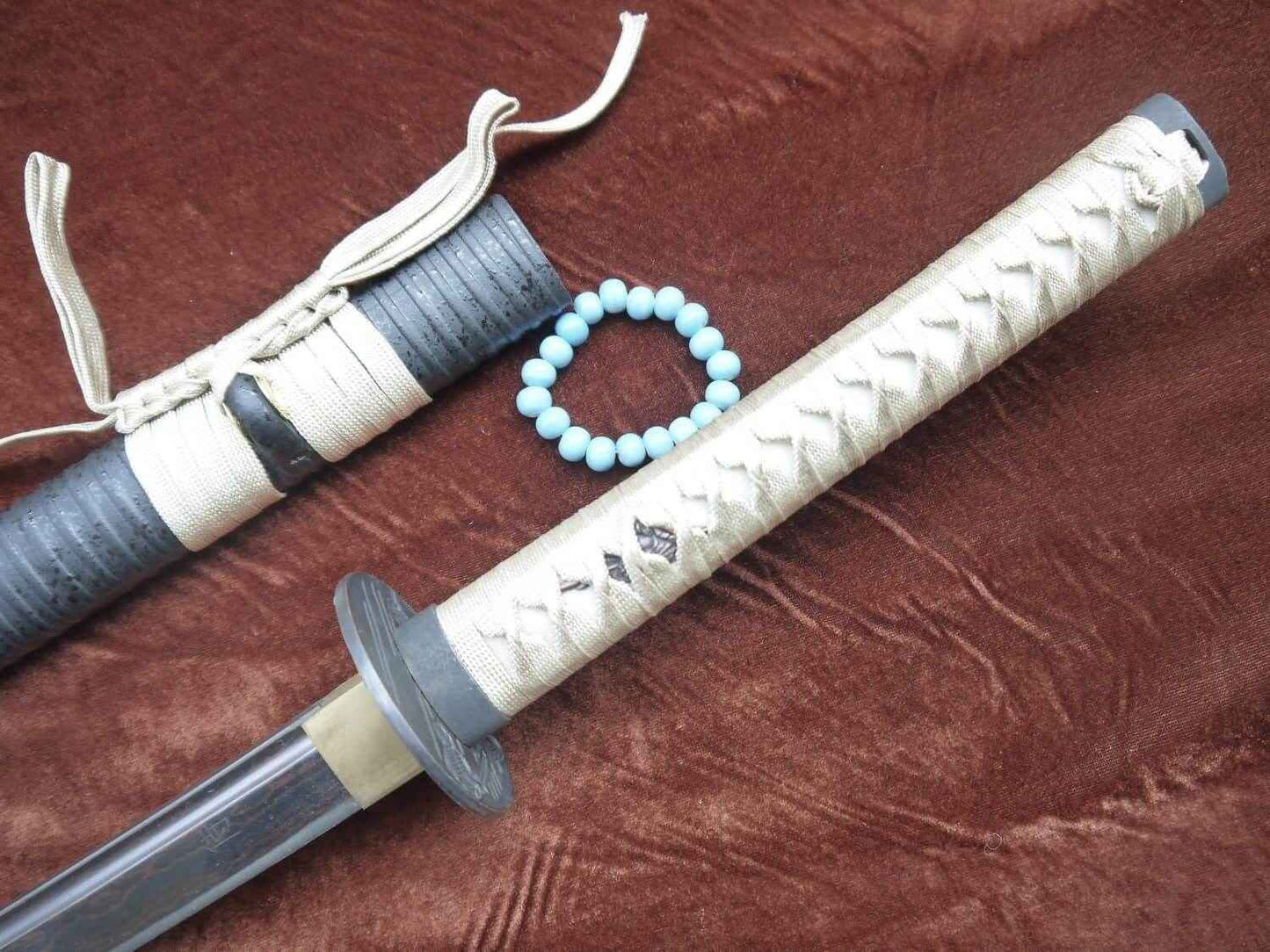 Samurai war sword Katana/Damascus steel blade/Alloy tosogu Full tang — handle and fittings close-up