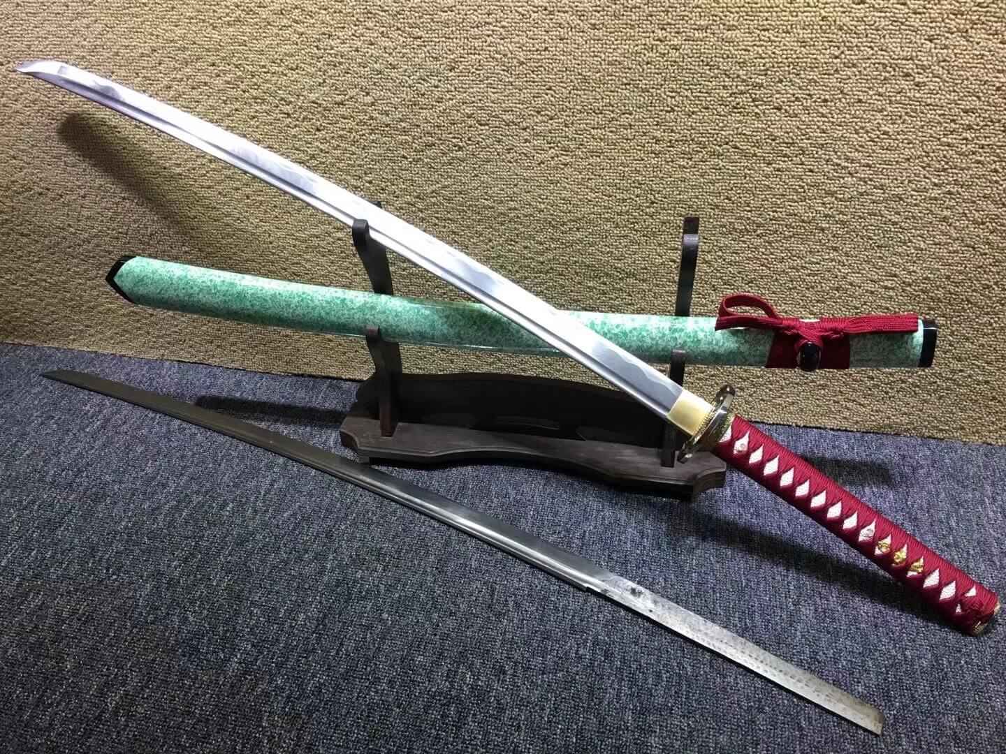 Katana,Medium carbon steel bade,Light green scabbard — close-up detail view