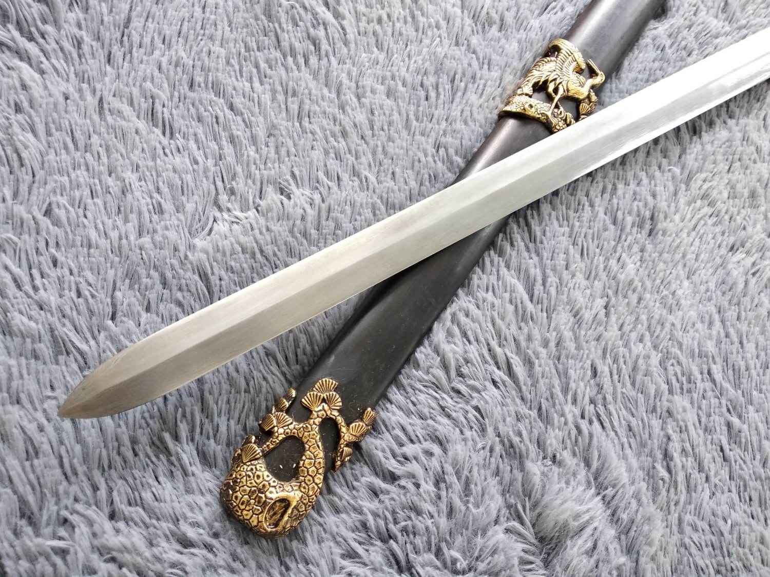 Pine crane sword,Damascus steel blade,Black wood,Alloy — handle and fittings close-up